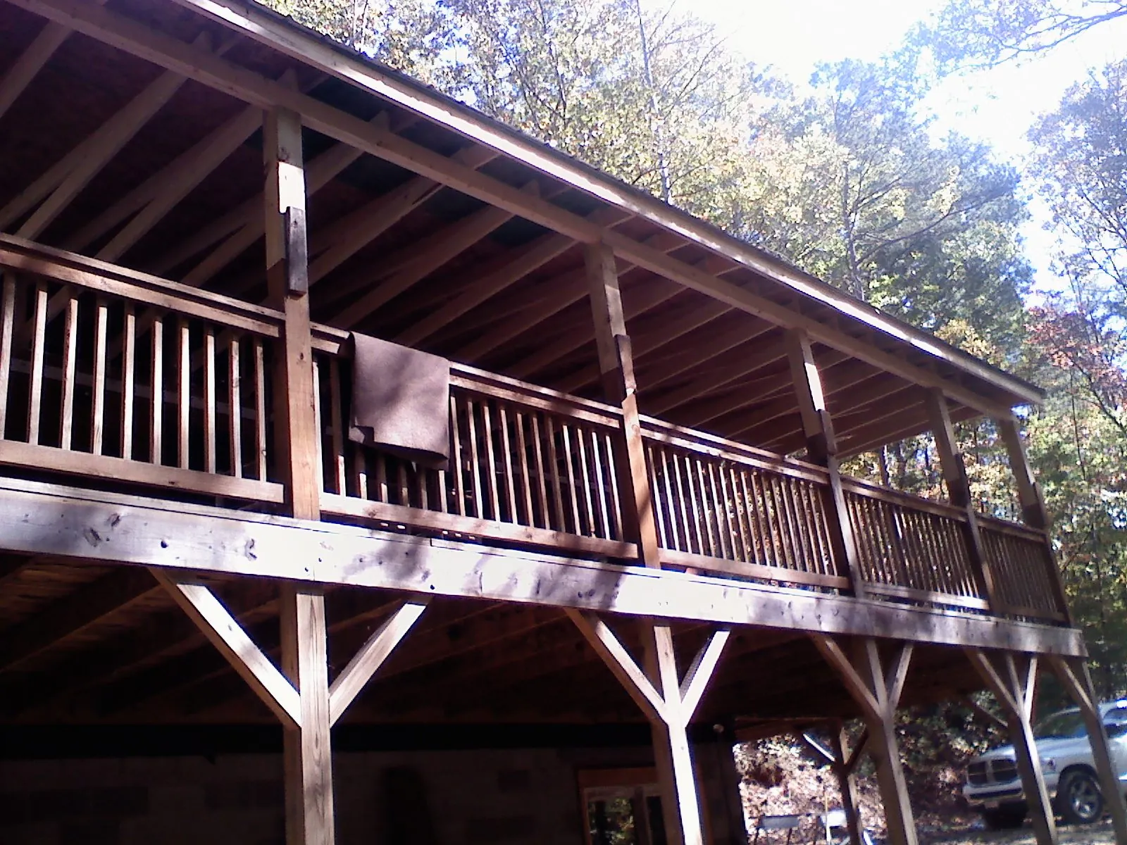 Timber framing under a new elevated porch and deck — Roof Leak Repair in Oakboro by Roofing Brothers
